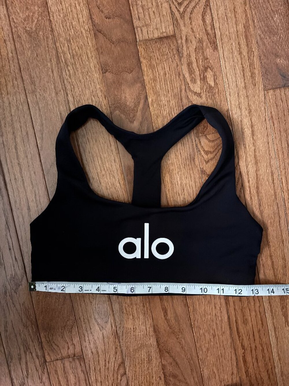 ALO Yoga Black Racerback Sports Bra with Iconic White Logo